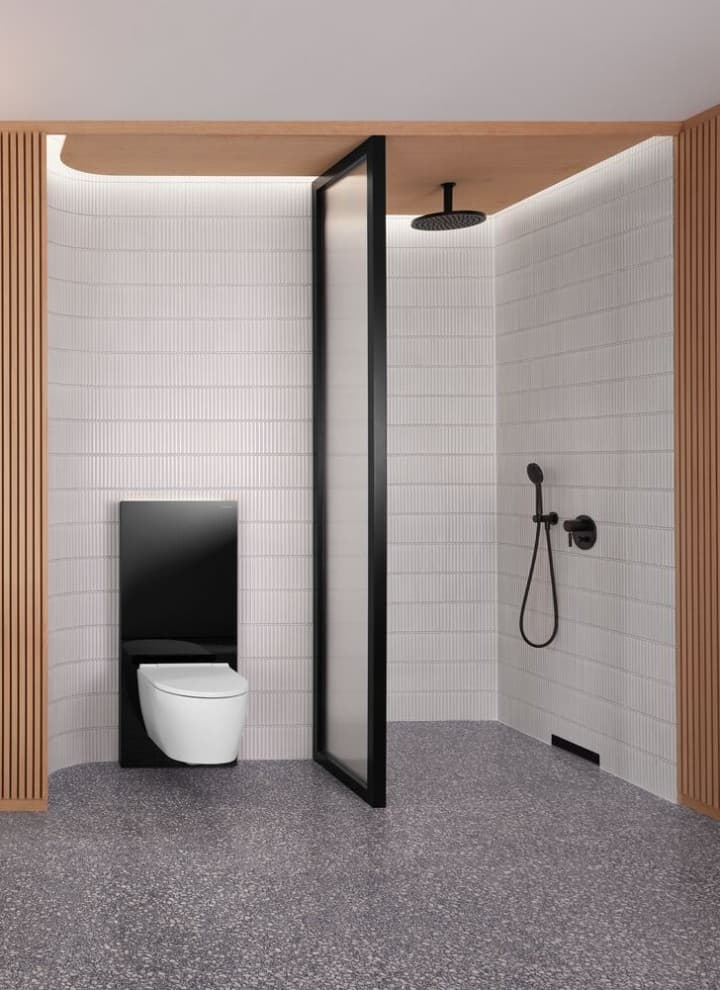 Douche au design italien sophistiqué, avec possibilité d'intégrer un banc intégré et niche de rangement Douche au design italien sophistiqué, avec possibilité d'intégrer un banc intégré et niche de rangement